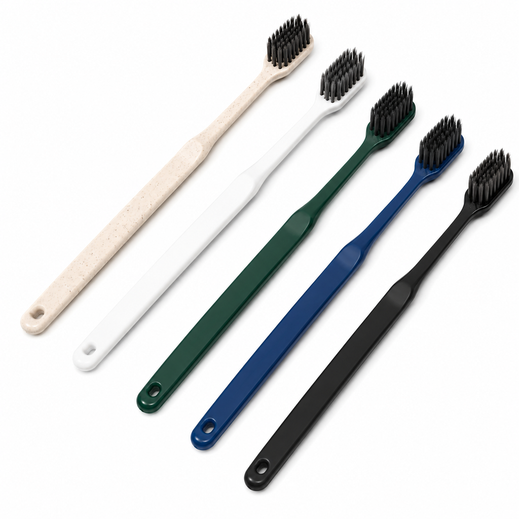 Trending disposable hotel toothbrushes with bamboo charcoal soft bristles on white background