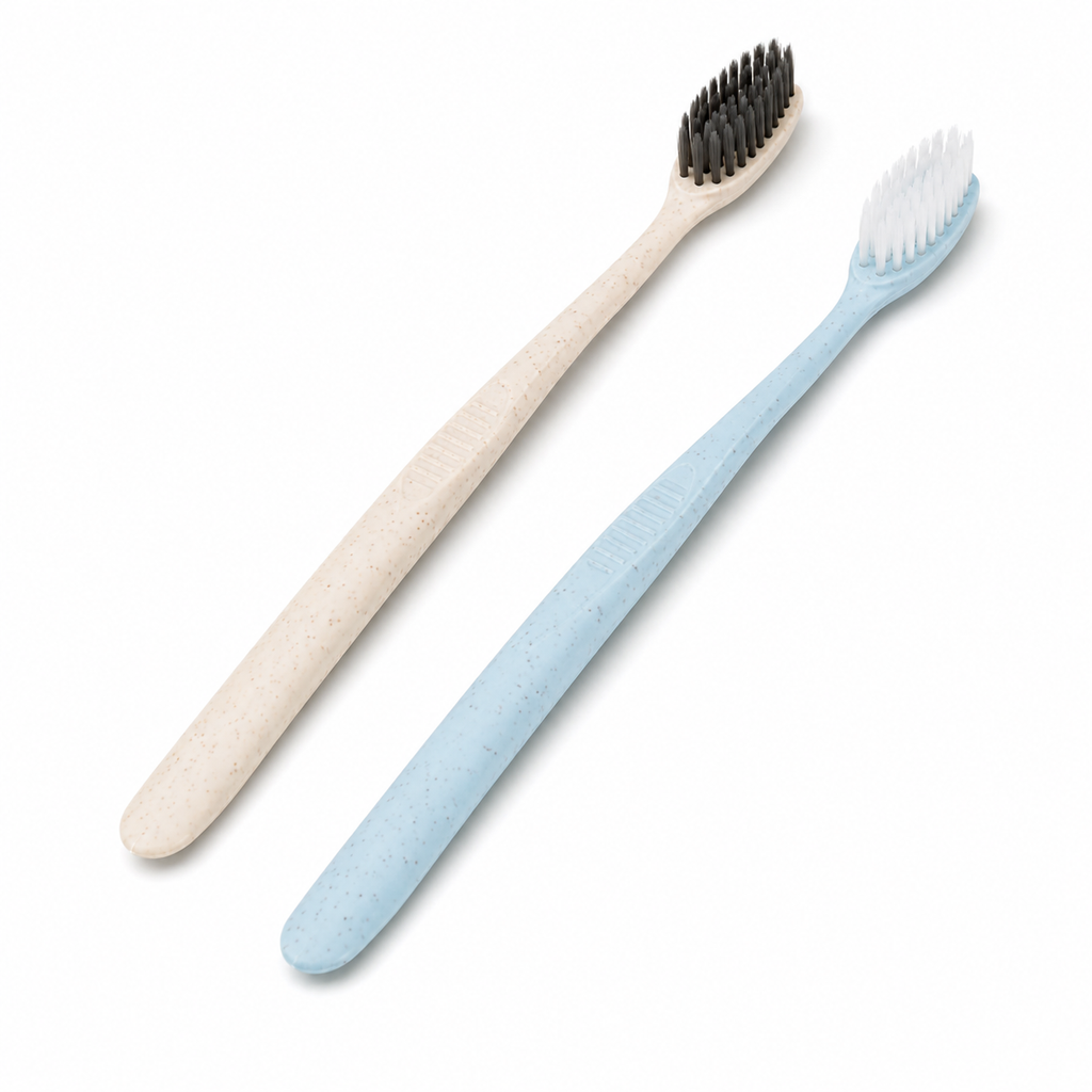 Angled head disposable hotel toothbrushes with soft bristles on white background