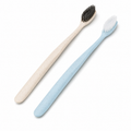 Angled head disposable hotel toothbrushes with soft bristles on white background