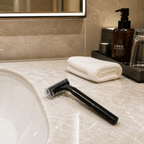travel razor displayed in luxury hotel bathroom
