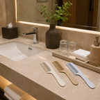 wide tooth hotel comb displayed in luxury bathroom setting