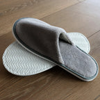hotel slippers with anti slip eva sole and soft fabric upper for guest use
