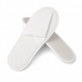 Terry cloth hotel slippers with anti-slip sole