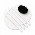 cotton pads cotton swabs and black hair tie for hotel vanity kit