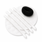 cotton pads cotton swabs and black hair tie for hotel vanity kit
